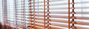 A close up of the window blinds