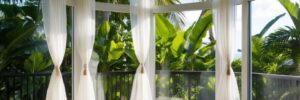 The Ultimate Guide to Sunroom Window Treatments for South Florida Living: Balancing Light, Views, and Comfort